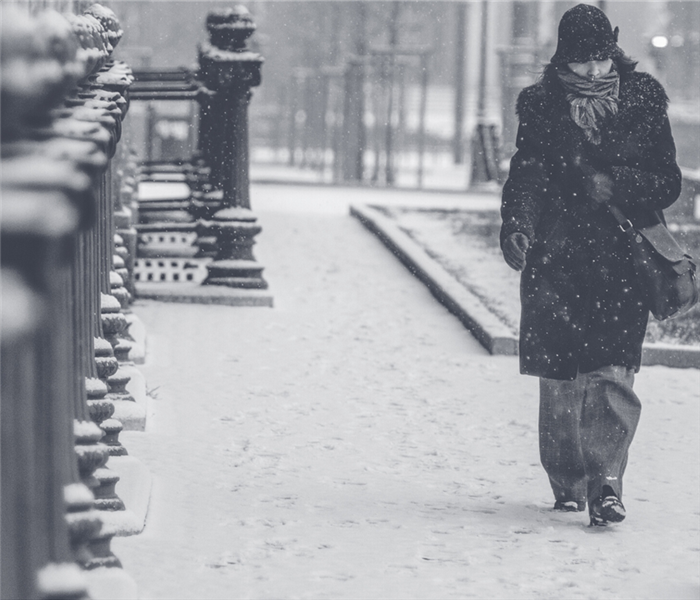 woman walking in snow
